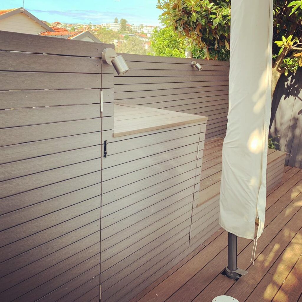 Pool equipment housing in two-tone composite