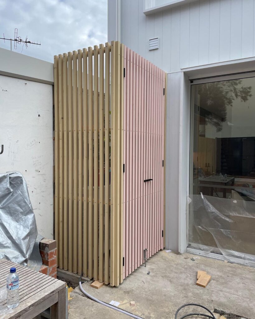 Combined air conditioning housing and outdoor storage