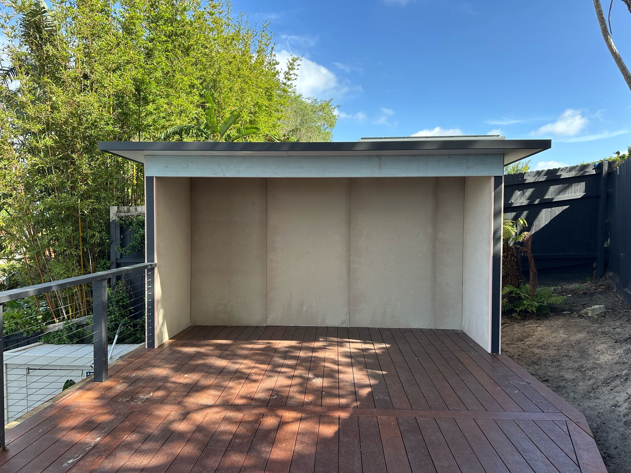 Internal timber cladding feature wall creating high-end indoor feel in Coogee outdoor entertaining station