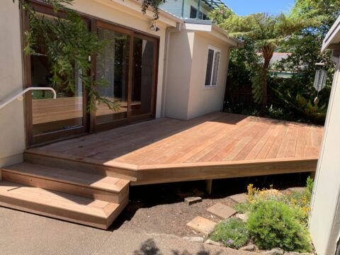Completed Ironbark deck and full-width garden landings viewed from driveway, Little Bay
