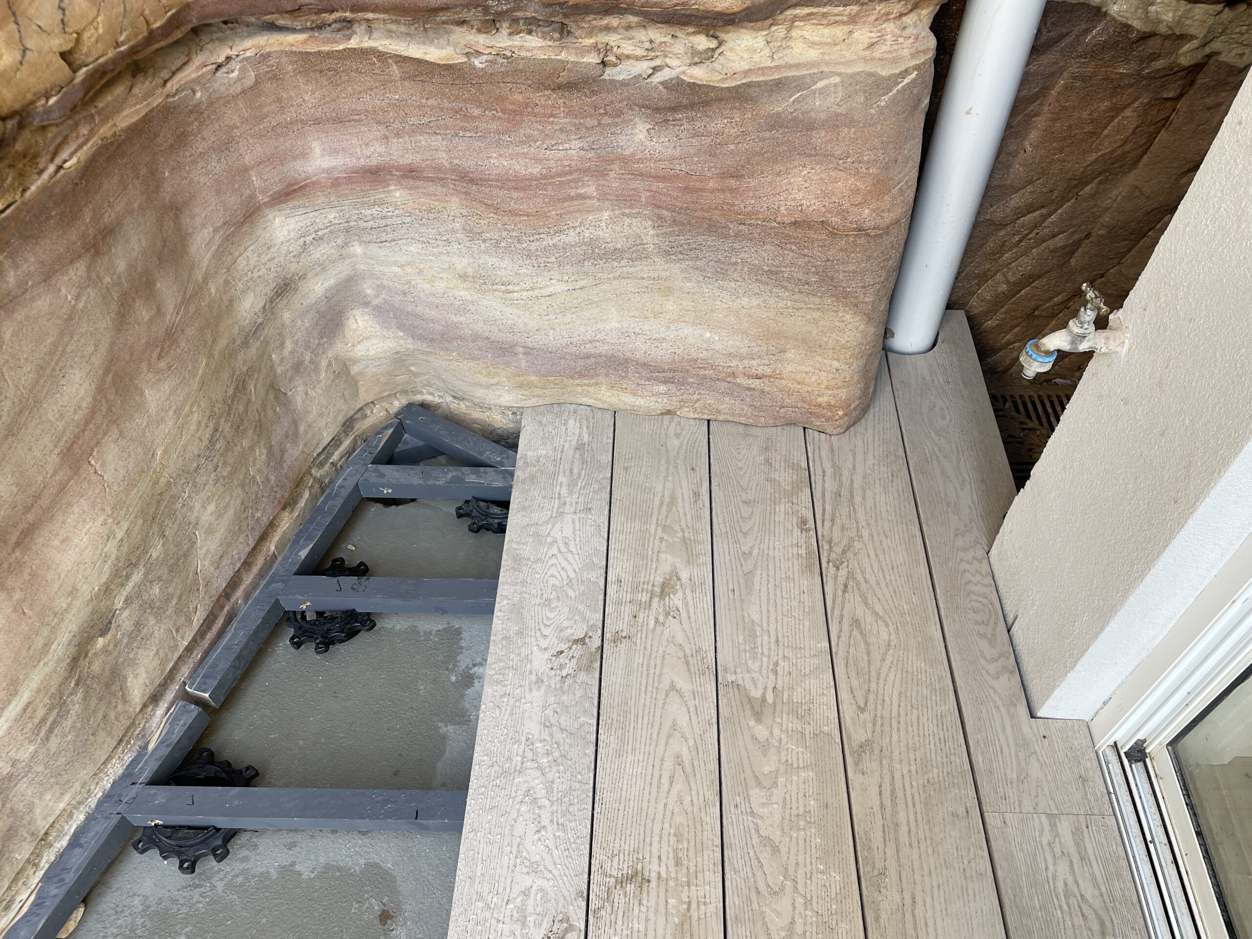 Millboard Limed Oak Coogee Lowdeck pedestals and secret scribe Giving away trade secrets — rock-scribed Millboard Limed Oak deck in Bronte