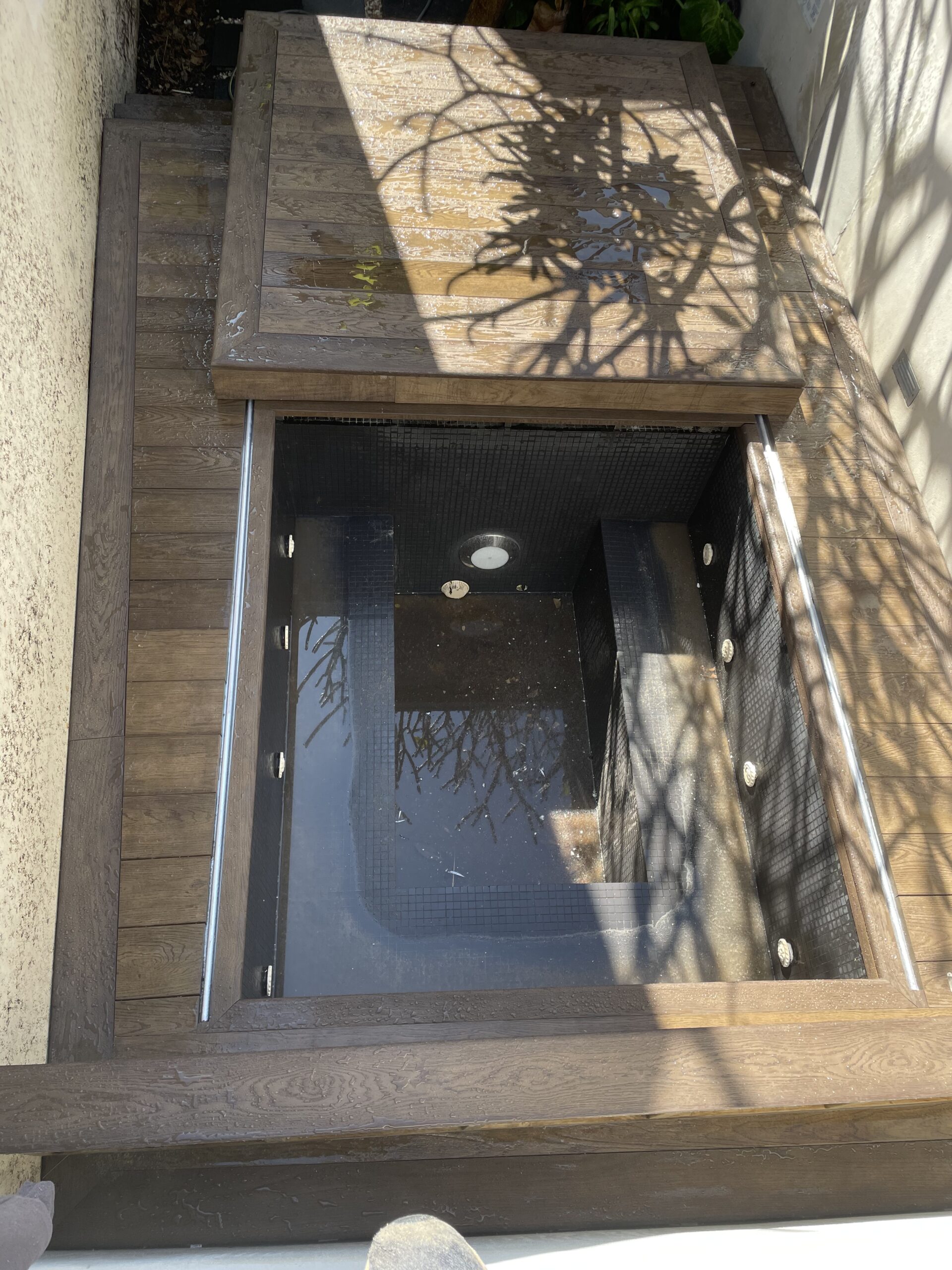 Millboard Lowdeck sliding pool cover Open Spa position — low-clearance spa deck in Paddington
