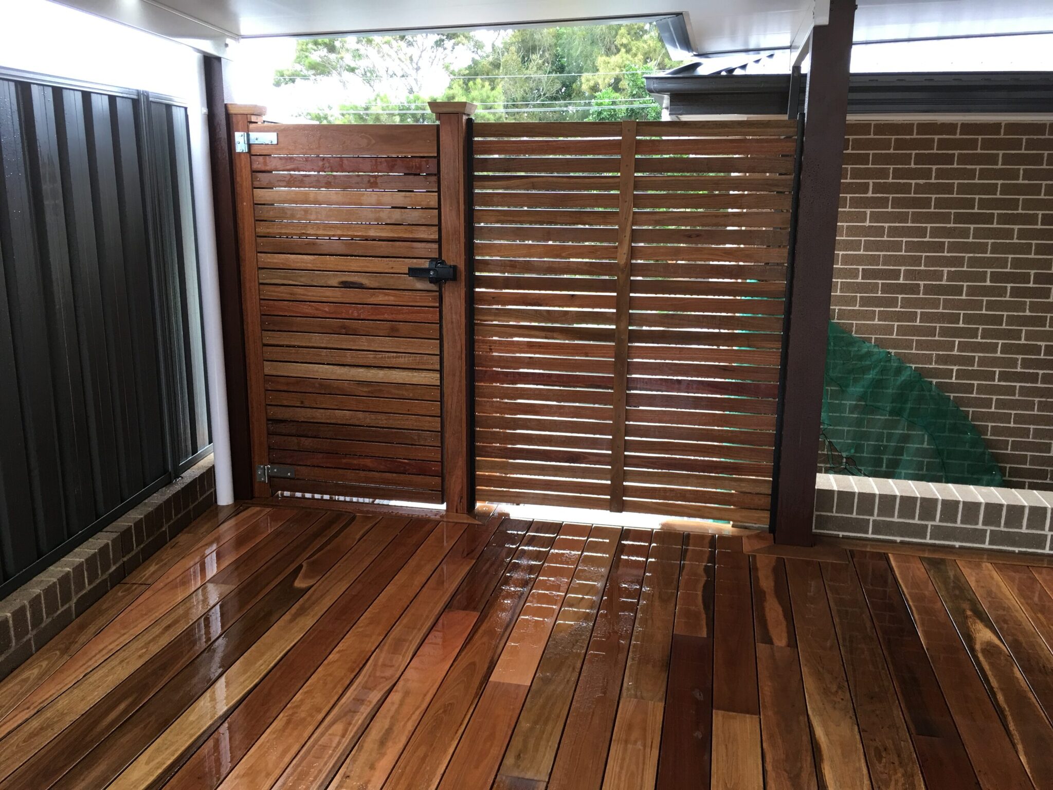 Matching Spotted Gum security gate and privacy screen in Little Bay
