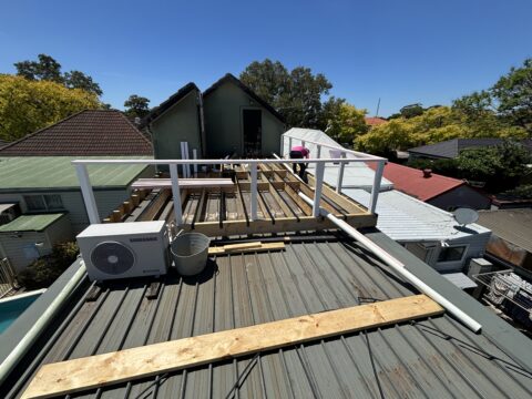 Balustrade posts installed in deck frame, Mascot rooftop