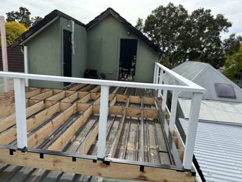 Joist tape and framing protection installed on Mascot rooftop frame