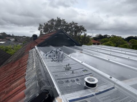 EzGlaze polycarbonate sheets being installed on Mascot pergola