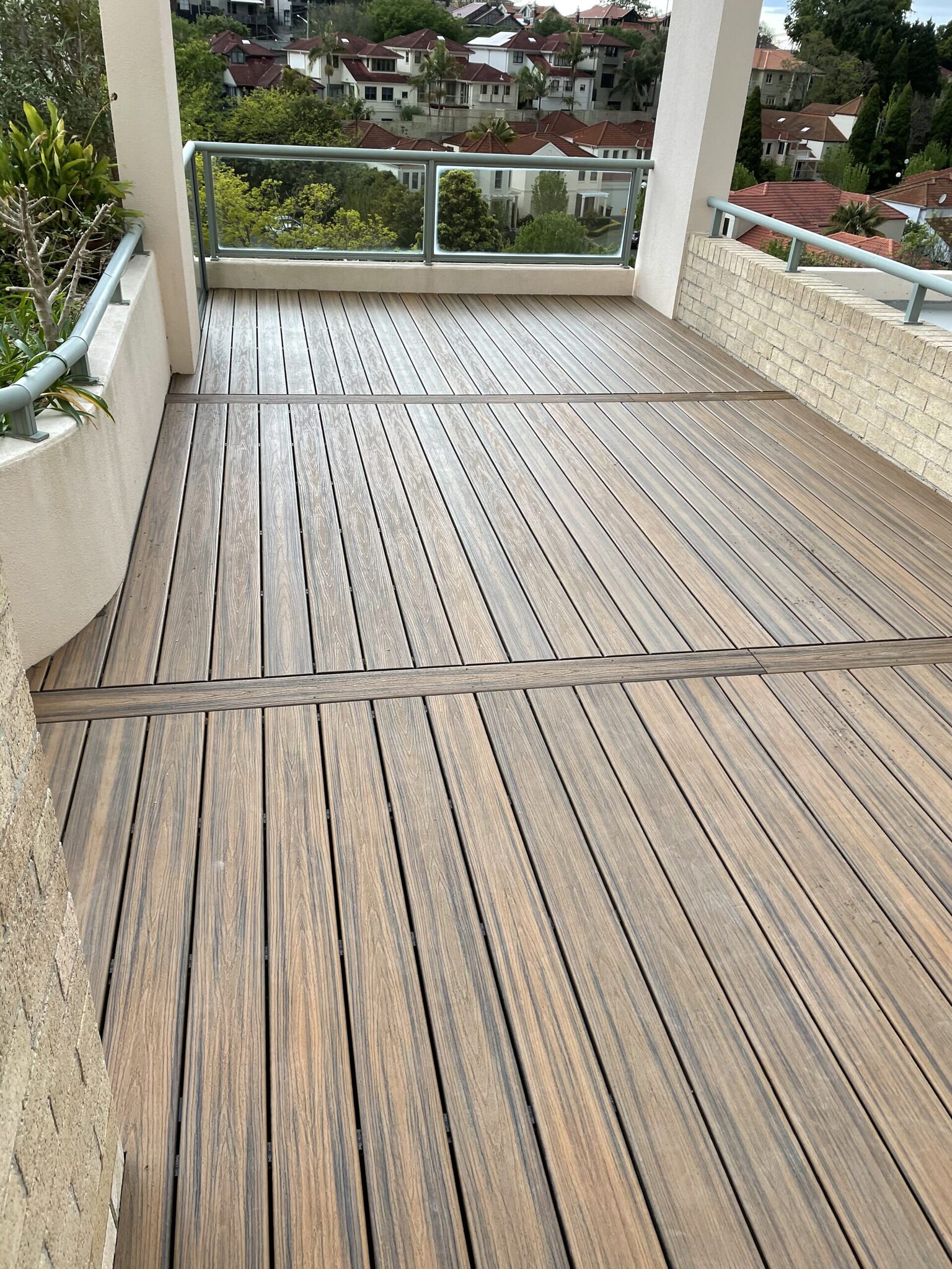 Trex lowdeck pedestal with breaker boards Kensington Comlete — floating rooftop balcony deck in Kensington