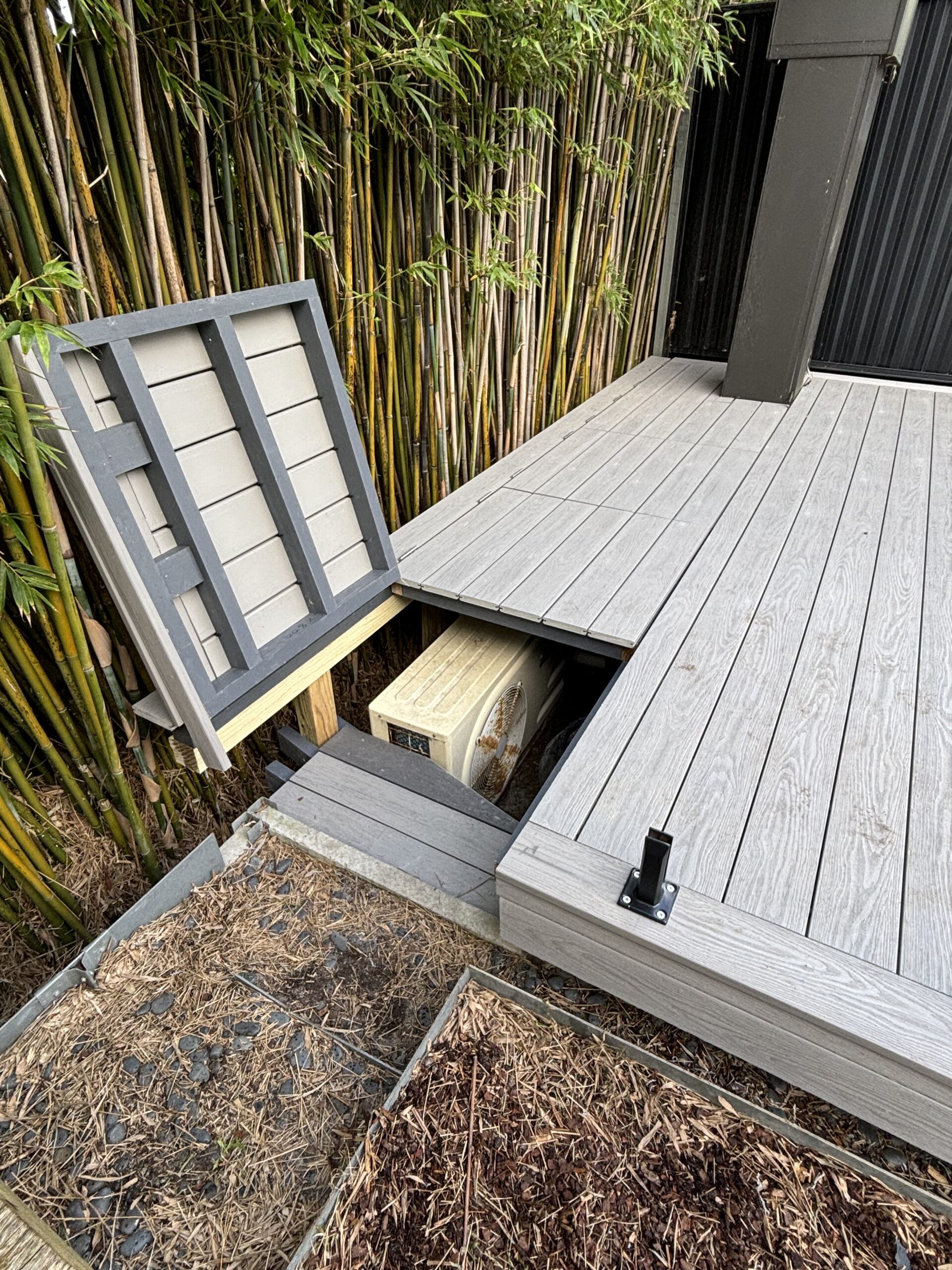First stealth hatch open — pool equipment access — Kingsford