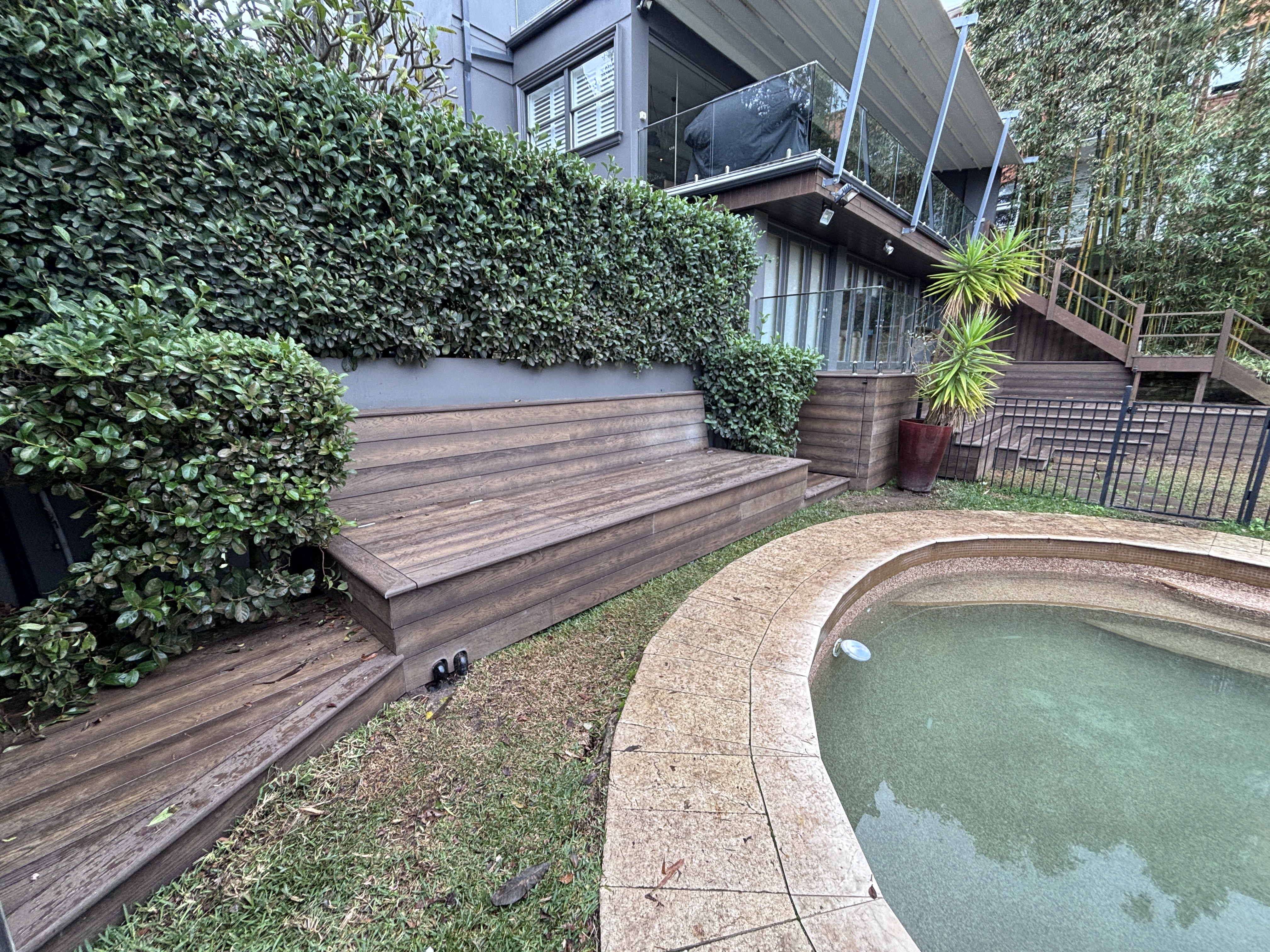 Pool-side bench seating and glass balustrade, 100% complete, Vaucluse