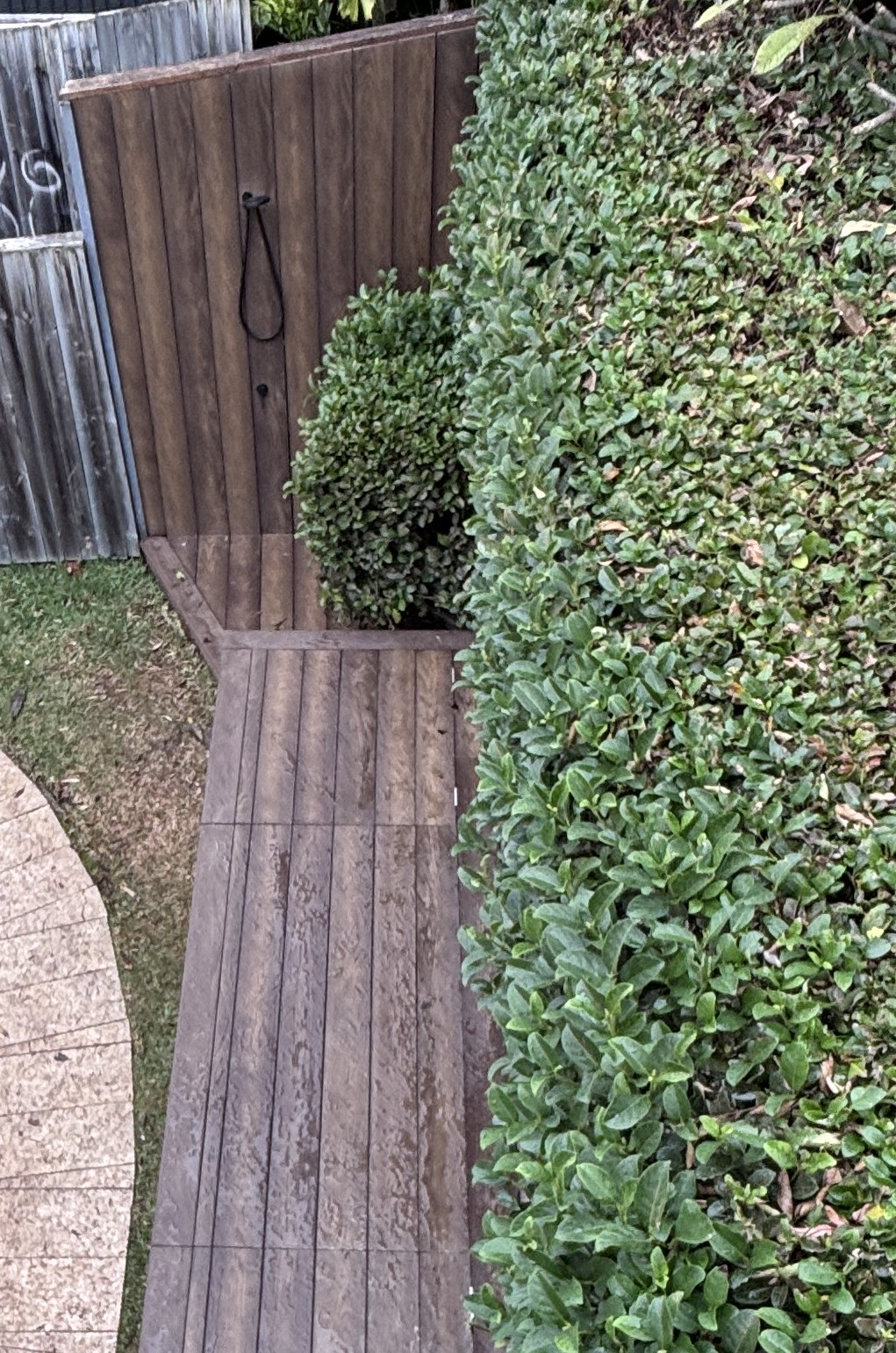 Rebuilt outdoor shower wall in Millboard Antique Oak, Vaucluse