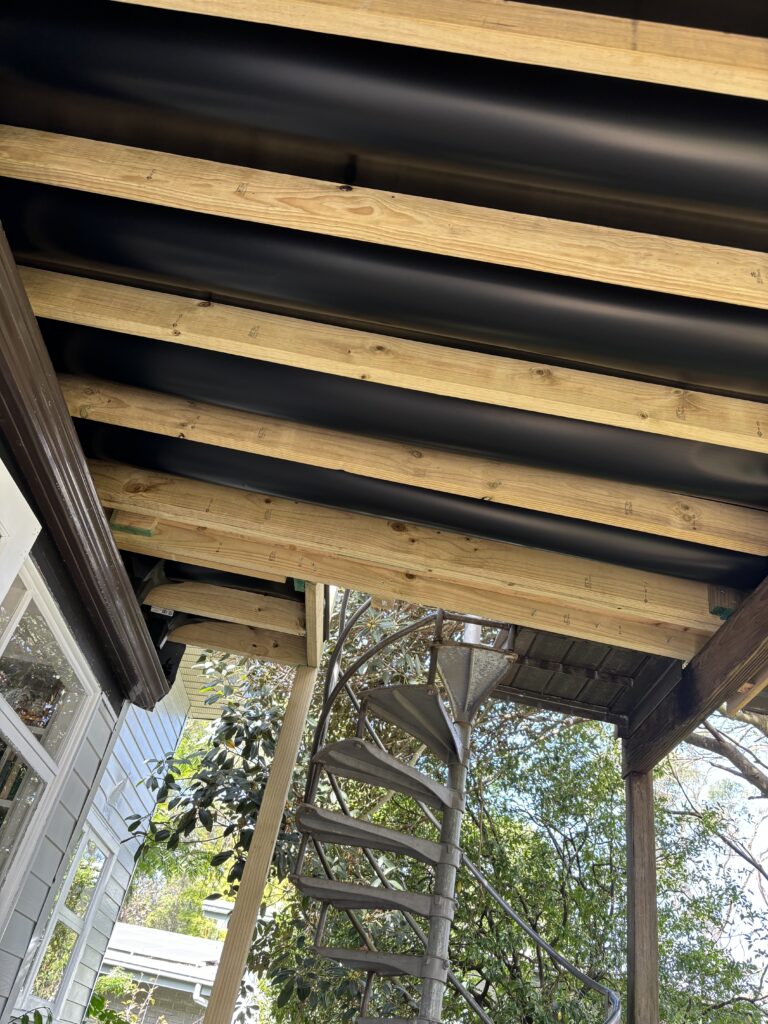 Close-up of the Trex RainEscape drainage system beneath the Bundeena deck