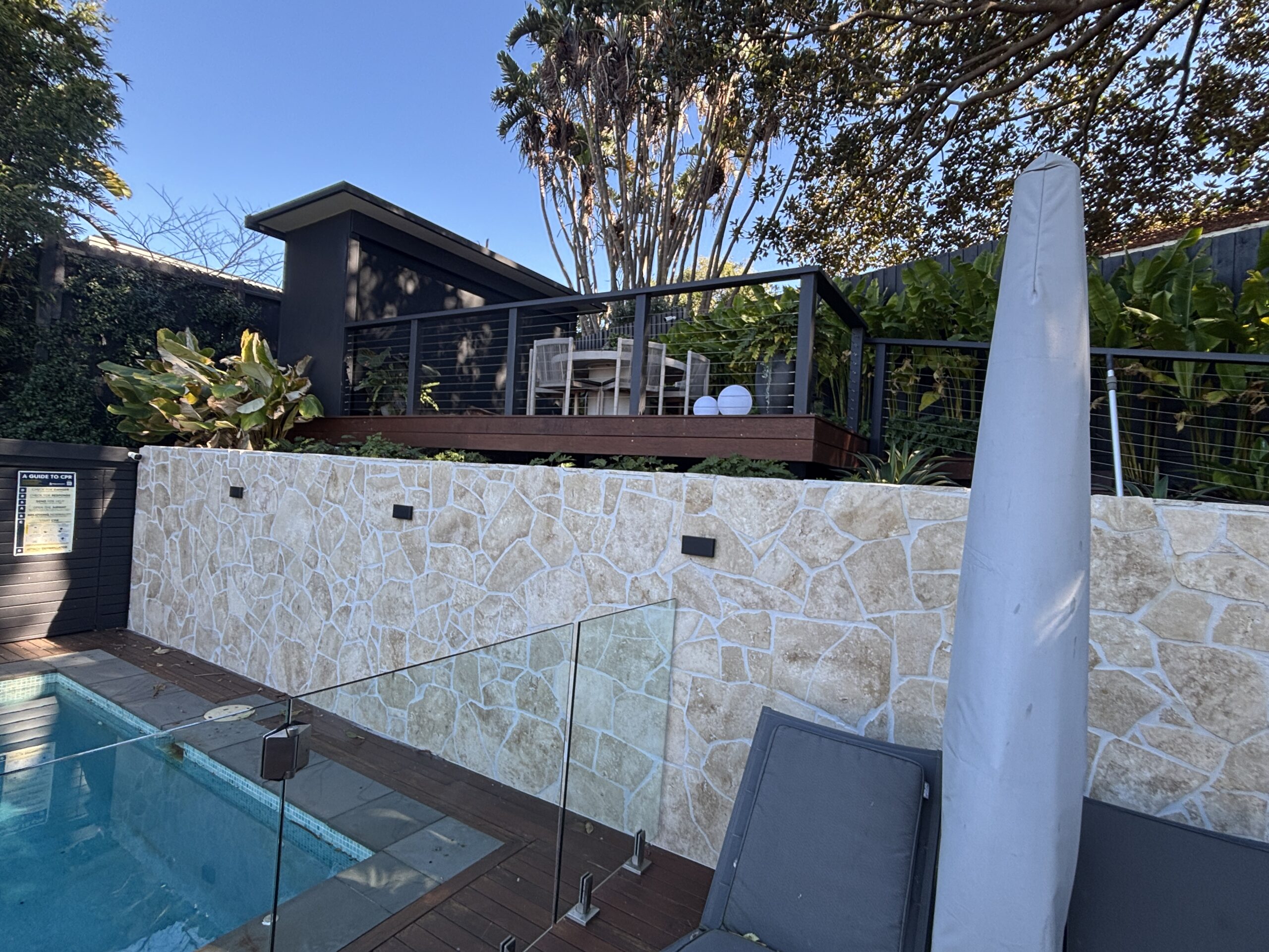 Outdoor kitchen with the retractable blind closed, Coogee