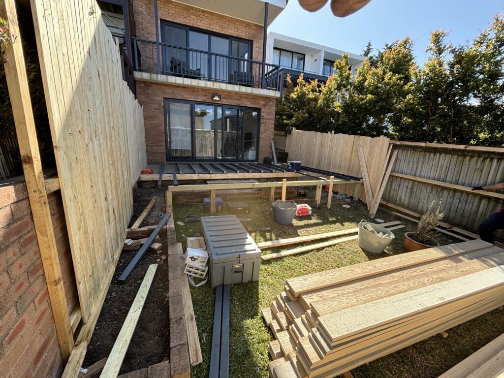 Deck frame underway with the new dressed pine fence going up, Dover Heights