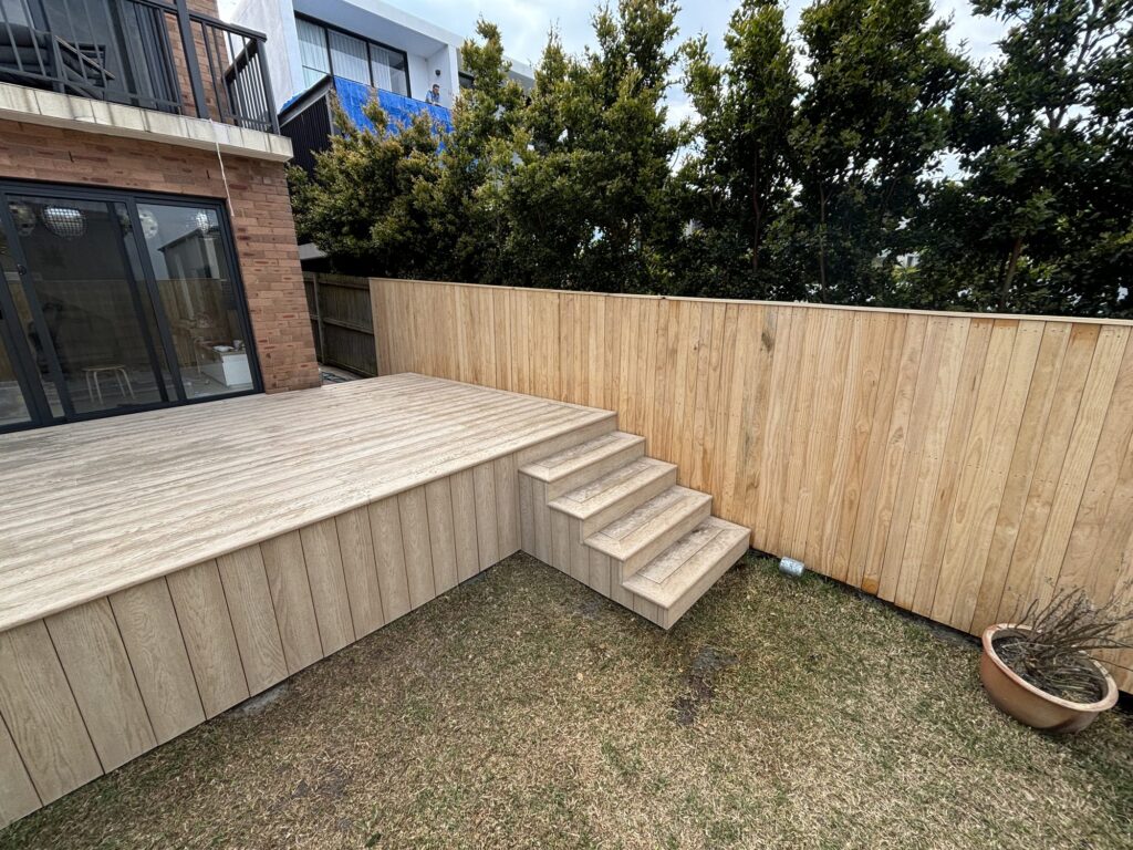 Finished deck showing inset corner stairs and decking clad fascia, Dover Heights