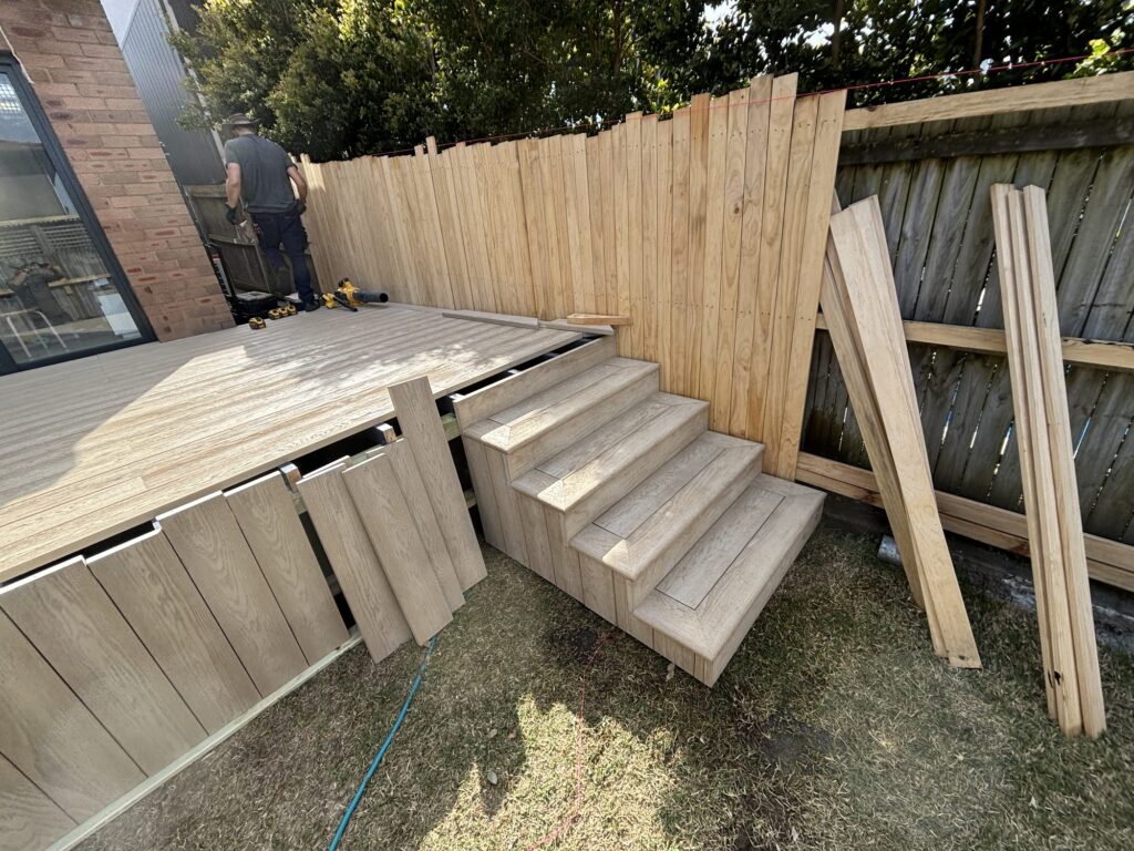 Fascia clad in matching decking beside the inset corner stairs, Dover Heights