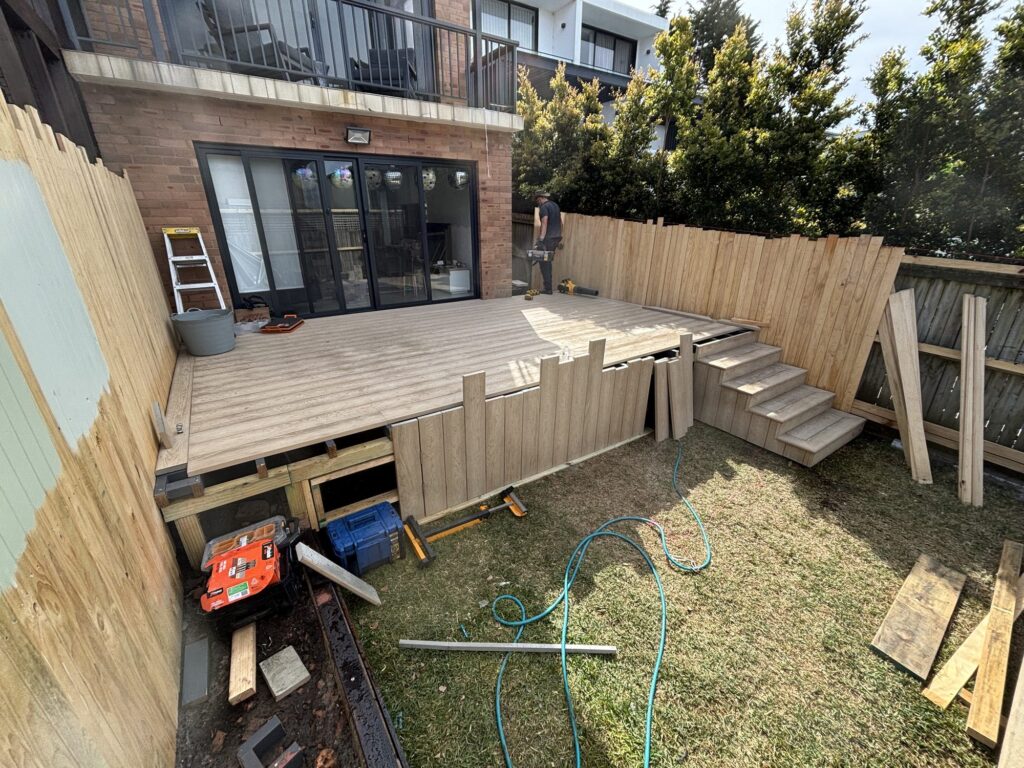 Millboard Limes Oak decking boards laid with hidden fixings, Dover Heights