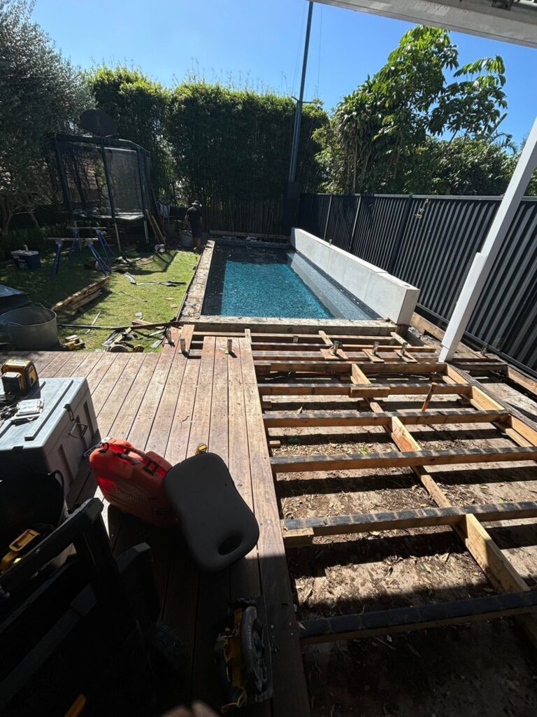 Demo begins you can see treated pine framing was used above the slab in Kingsford