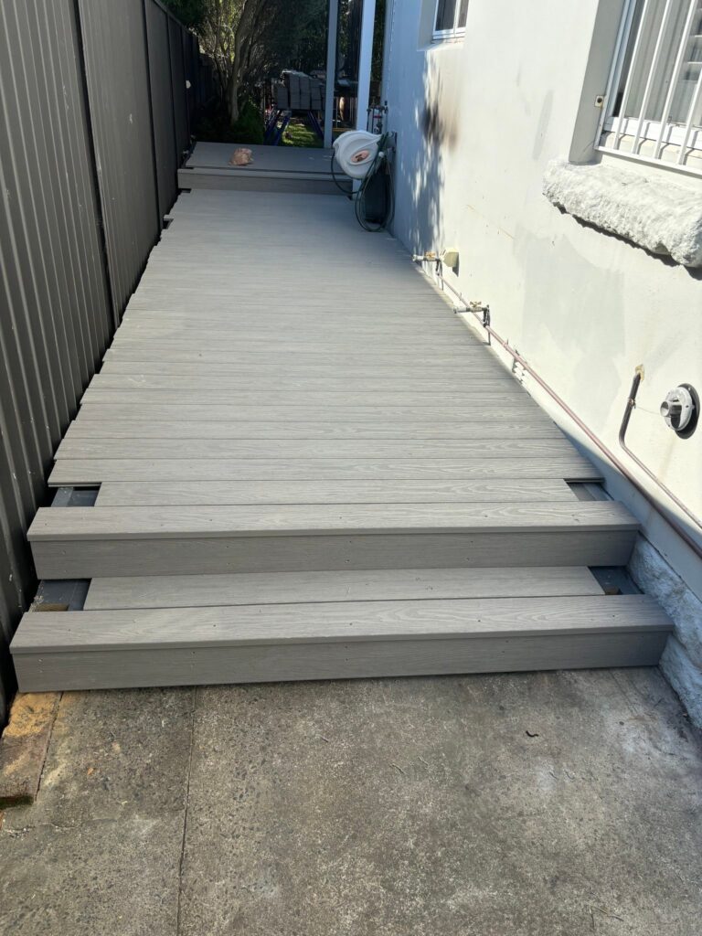 Passage ready before track — WoodEv decking in Kingsford