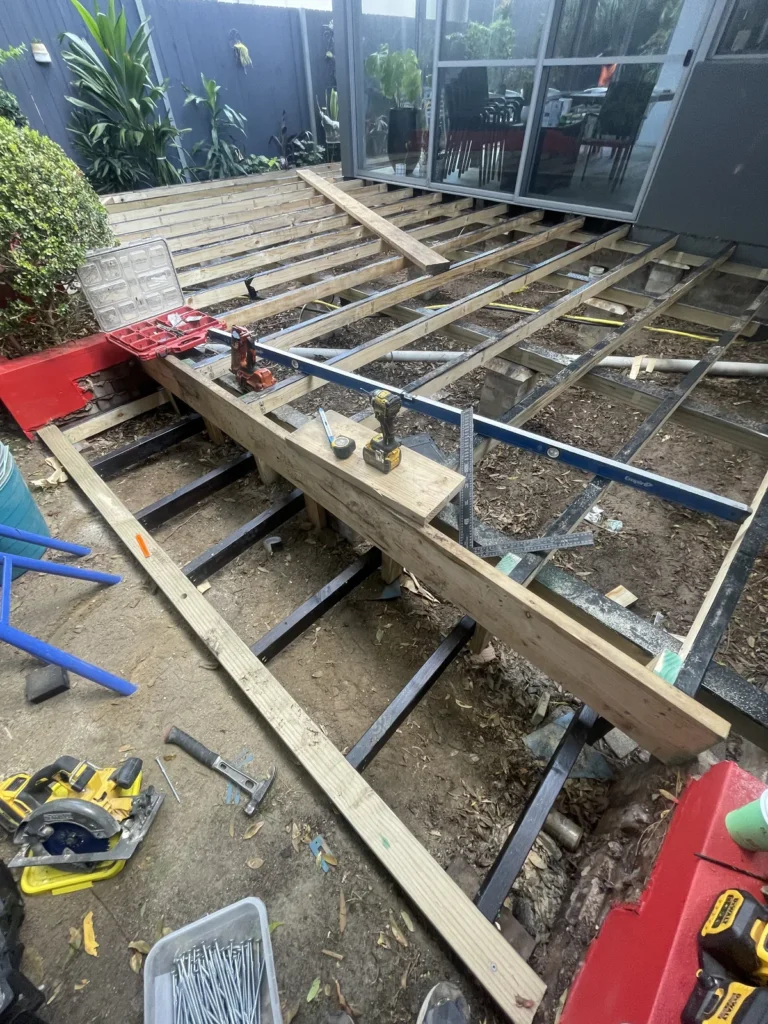 Joist protection running along every joist of the H3 treated pine frame at Kyogle Street Maroubra, levelled before decking