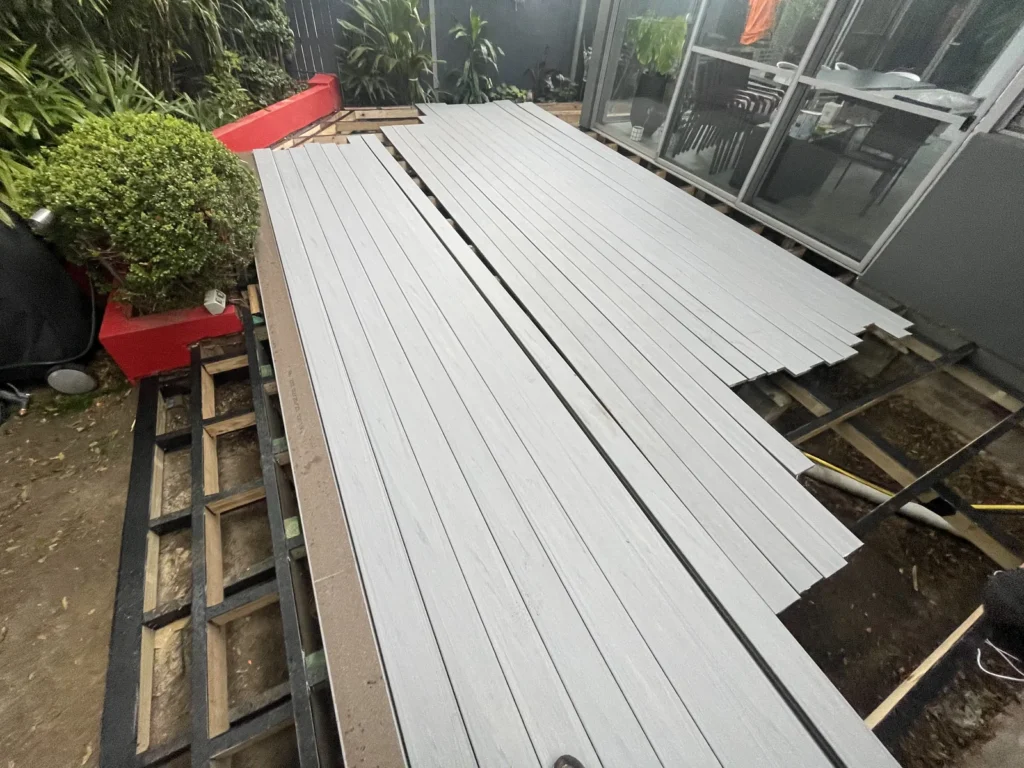 Trex Lineage decking in Rainier going down over the new frame in Maroubra