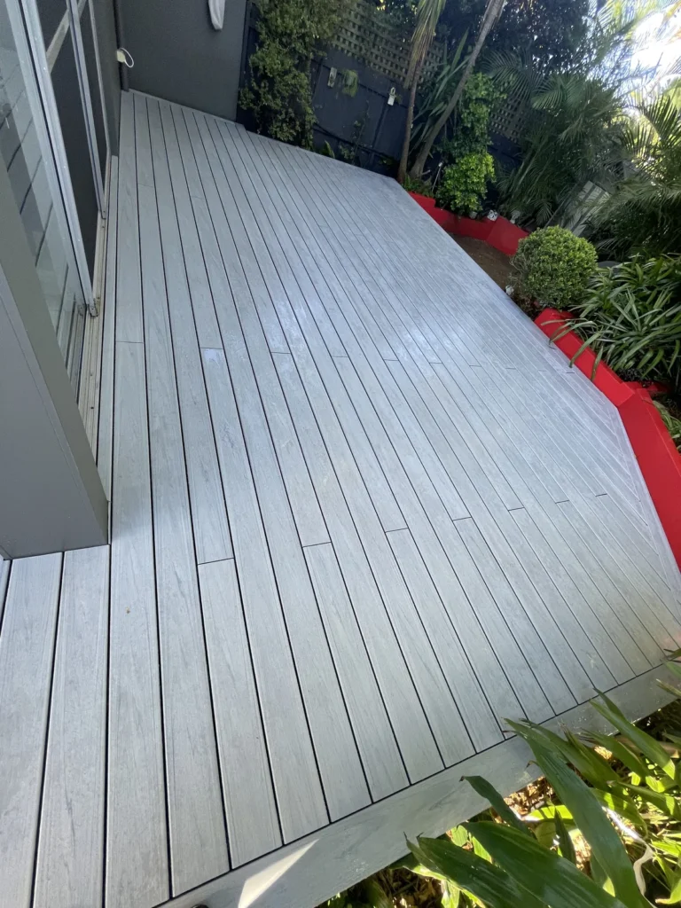 Narrow run of Trex Lineage decking in Rainier finished along the side of the house in Maroubra