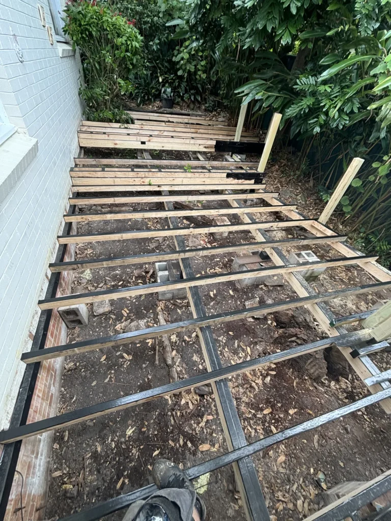 Balustrade posts and deck framing nearing completion, Neutral Bay